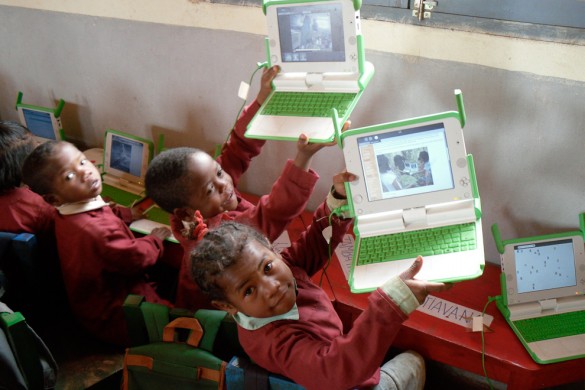 Children using OLPC's XO laptop
